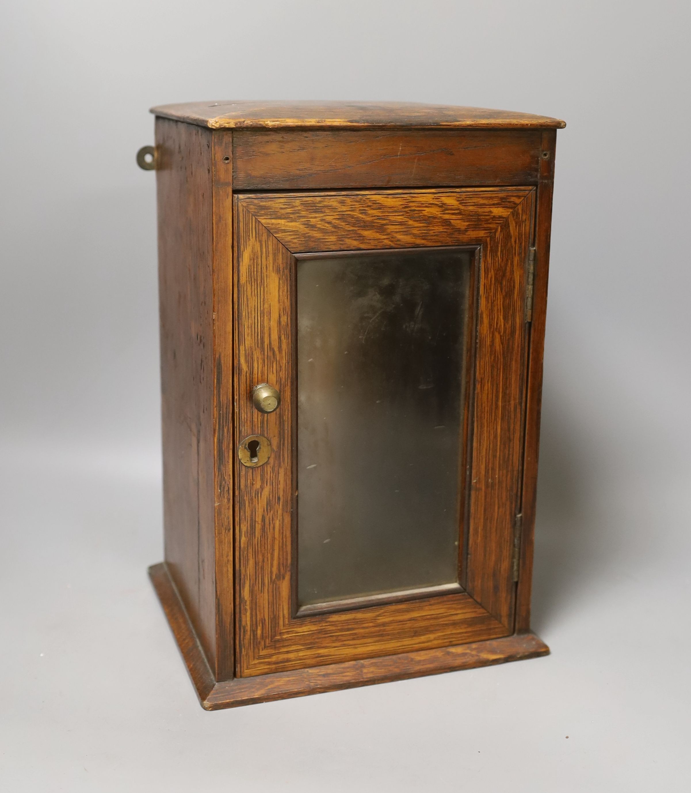 A small early 20th century country house oak letter box - 30cm tall